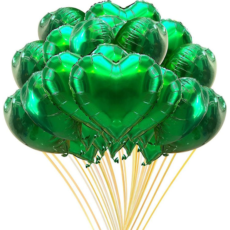 Grønt hjerteformede ballonger